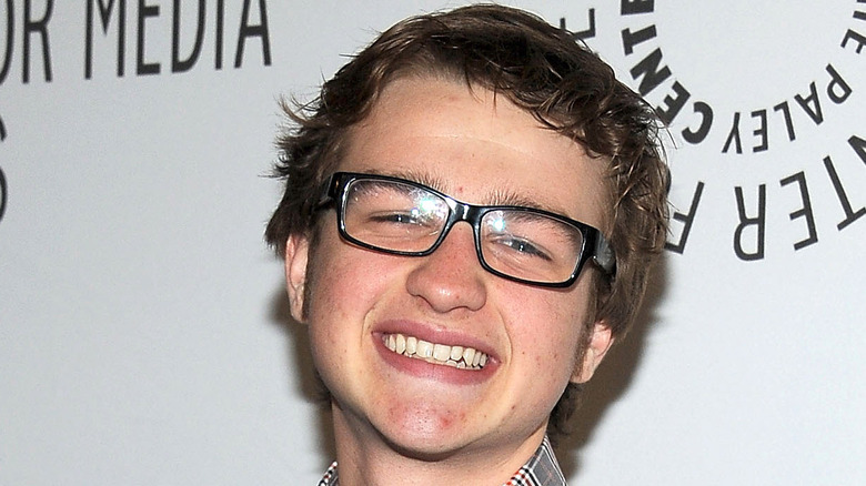 Angus T. Jones smiling