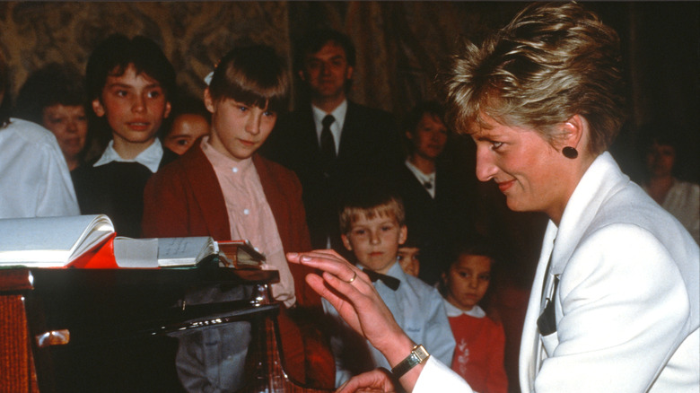 Princess Diana playing piano