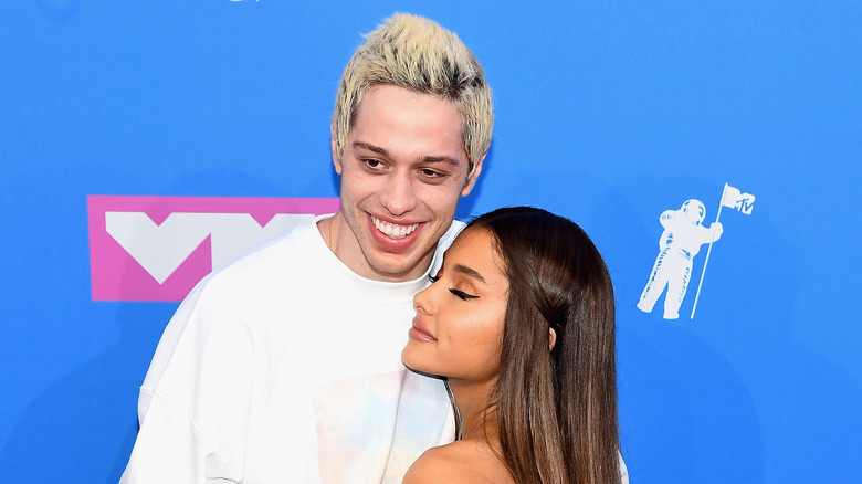 Pete Davidson and Ariana Grande posing together