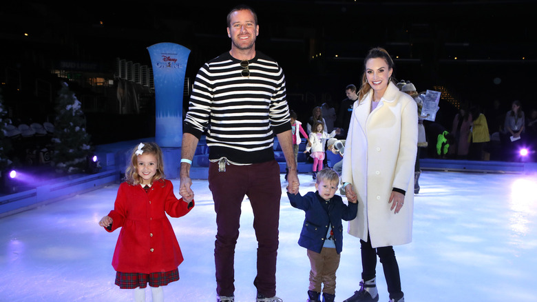 Armie Hammer and Elizabeth Chambers with children Harper and Ford attending Disney On Ice