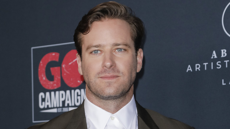 Armie Hammer posing at the Go Campaign's Go Gala