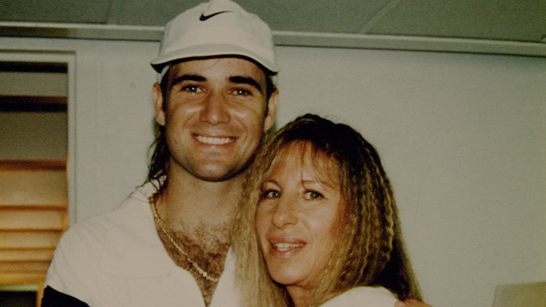 Andre Agassi and Barbra Streisand smiling