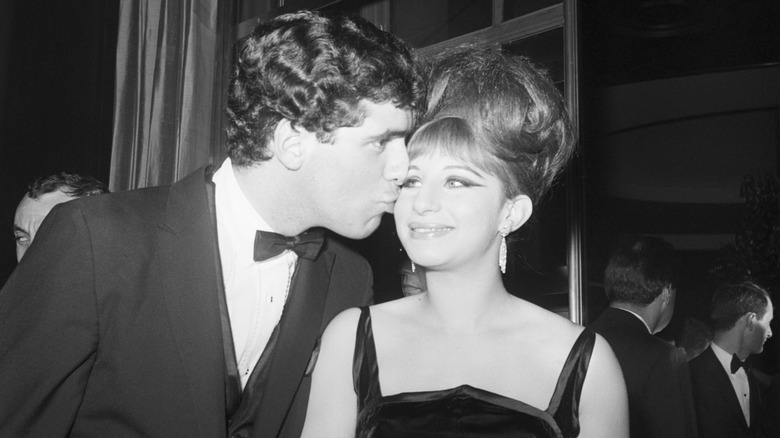 Elliott Gould kissing Barbra Streissand