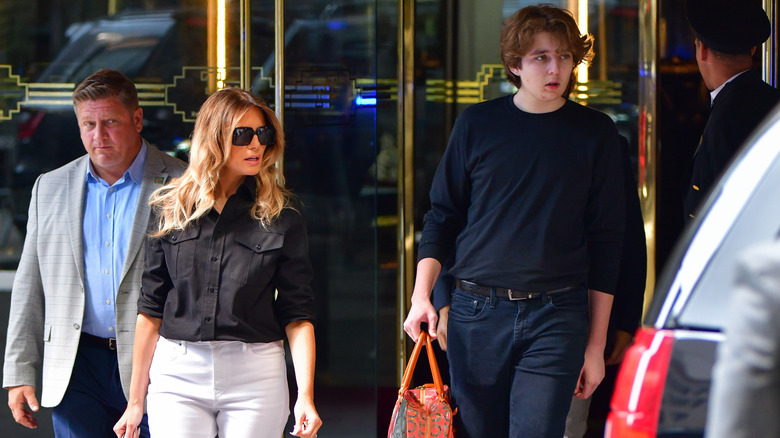 Melania and Barron Trump walking