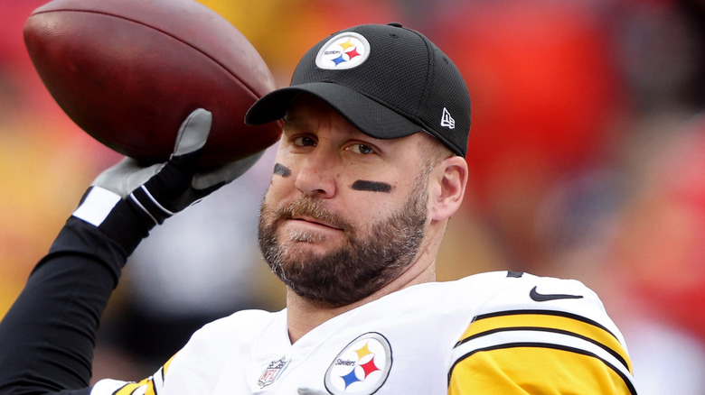 Ben Roethlisberger with a football