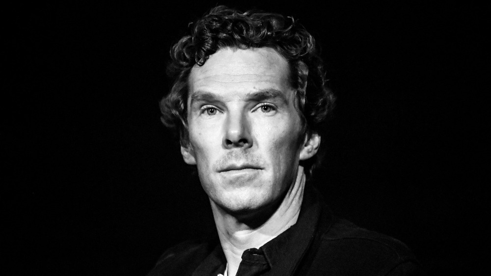 Benedict Cumberbatch posing stoically with head angled sideways for the camera