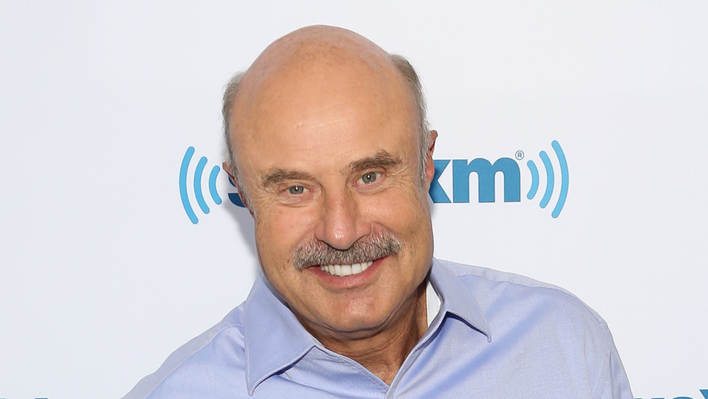 Dr Phil McGraw on a red carpet 