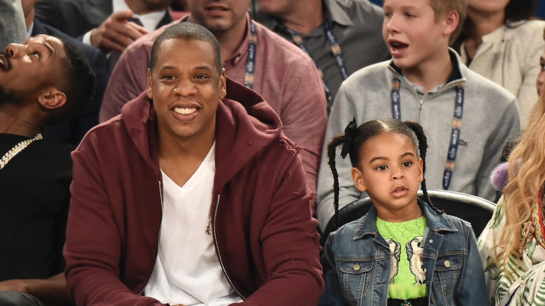 Jay-Z and Blue Ivy sitting together