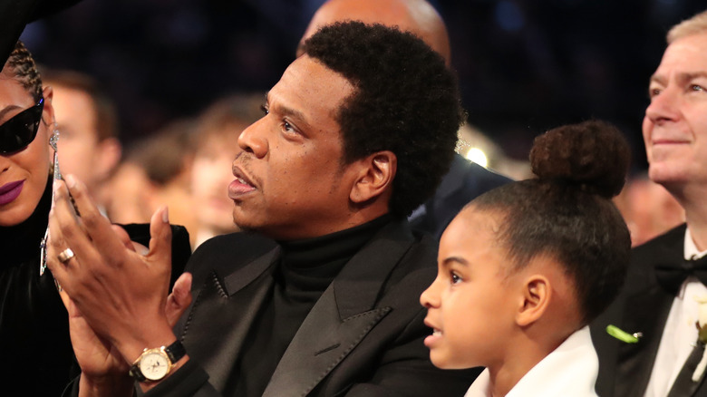 Jay Z and Blue Ivy sit together