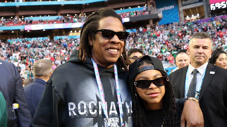 Jay-Z and Blue Ivy on the football field