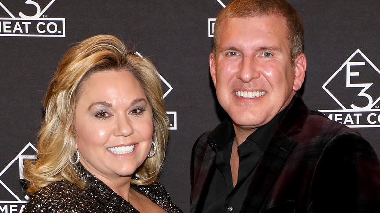 Julie and Todd Chrisley posing together