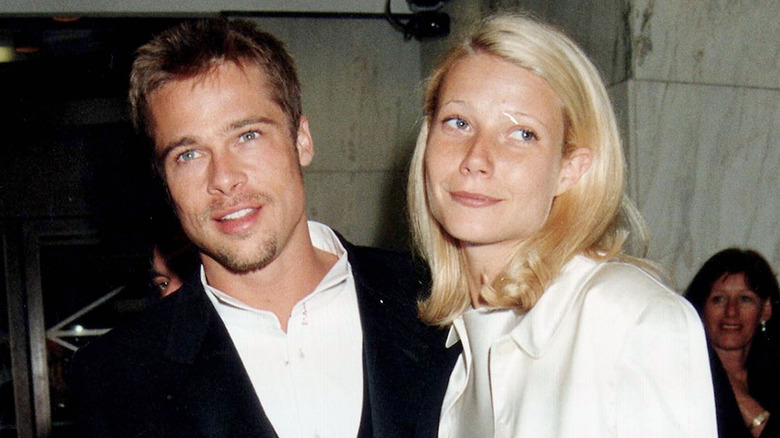 Gwyneth Paltrow and Brad Pitt smiling 