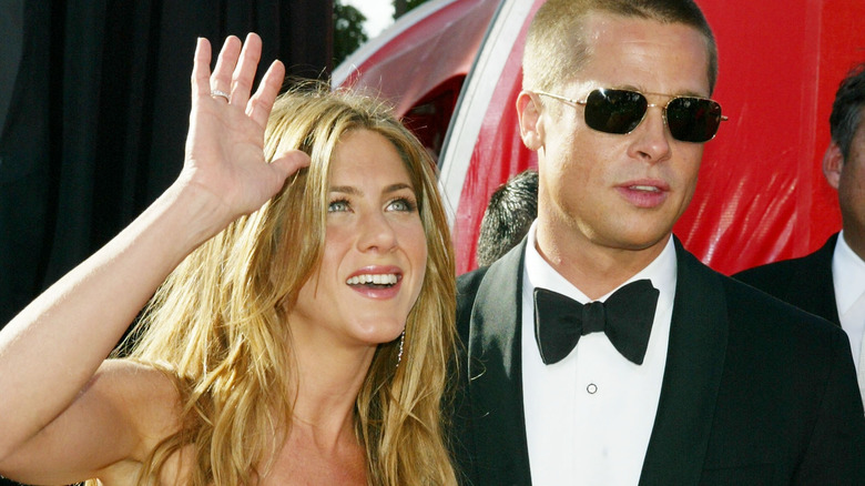 Jennifer Aniston and Brad Pitt smiling 