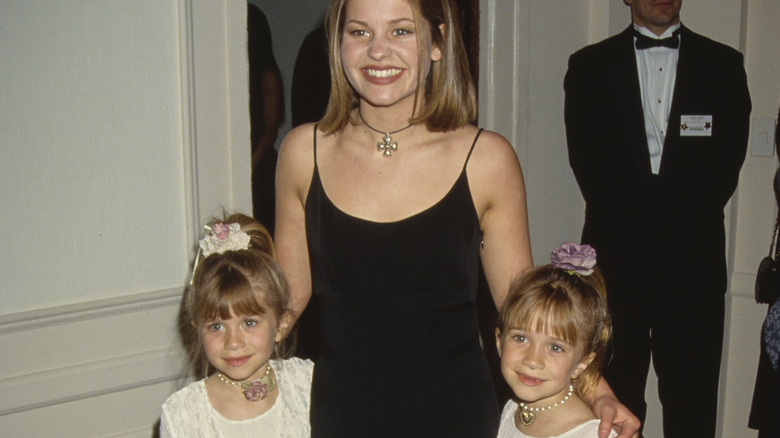 Candace Cameron with Mary-Kate and Ashley Olsen at an event