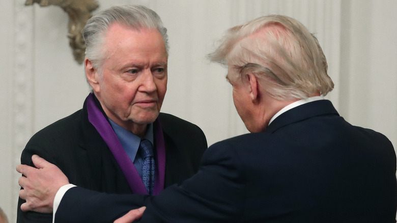 Jon Voight staring at Donald Trump