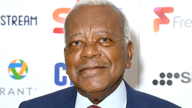 Sir Trevor McDonald on a red carpet