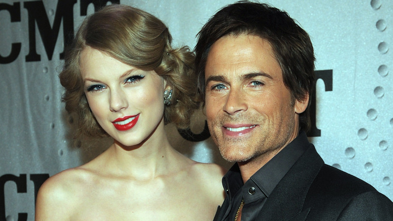 Taylor Swift and Rob Lowe posing