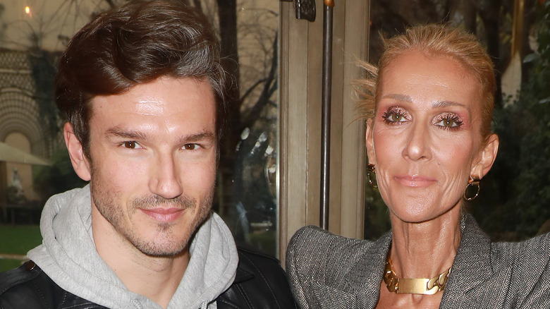 Celine Dion and Pepe Munoz smiling at runway show