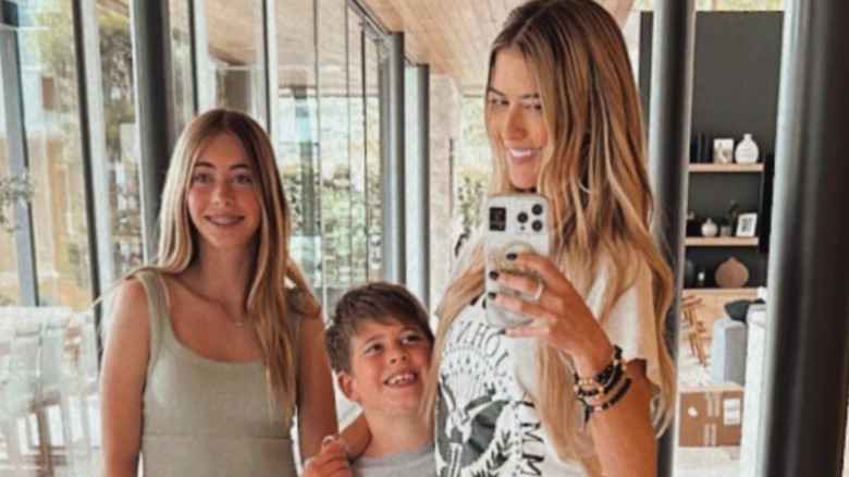 Christina Hall taking a selfie with her kids