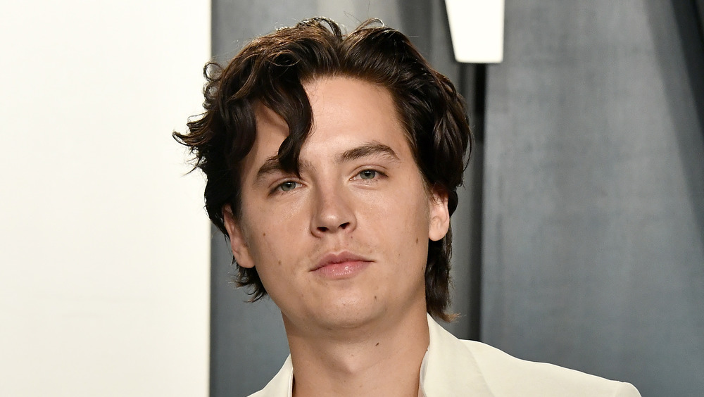 Cole Sprouse posing at a red carpet event