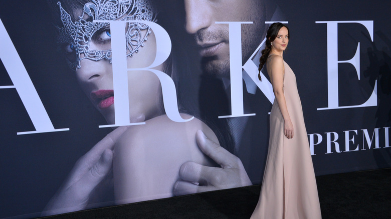 Dakota Johnson posing at the "Fifty Shades Darker" premiere