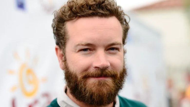 Danny Masterson green sweater smiling