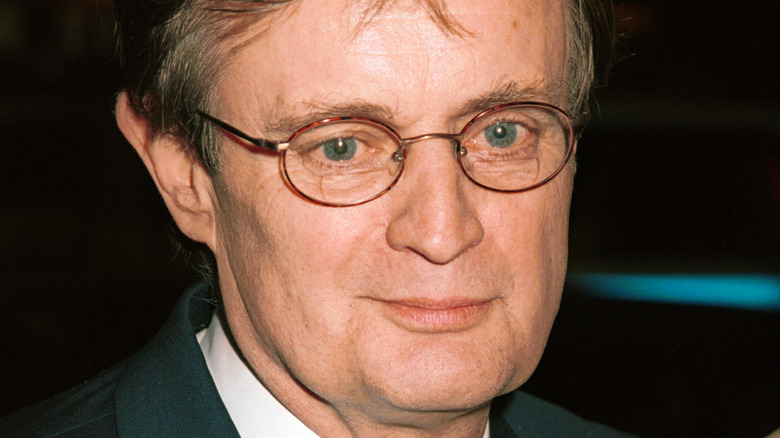 David McCallum wearing glasses