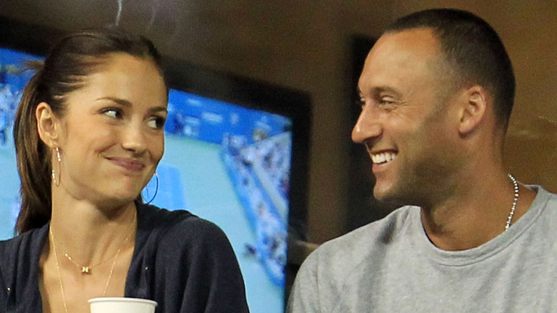 Minka Kelly and Derek Jeter smiling