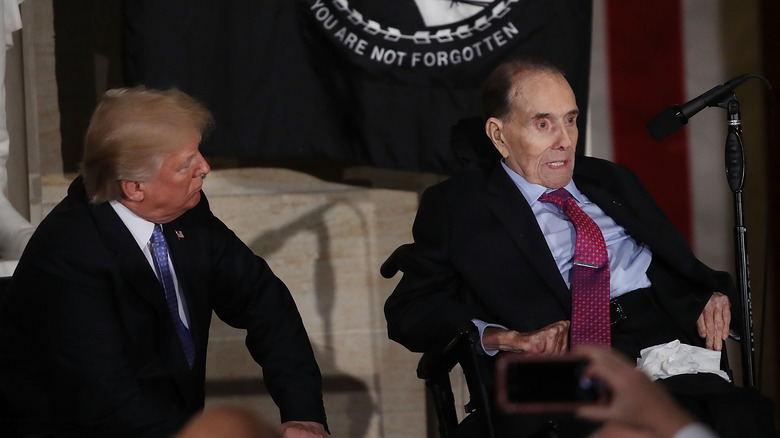 Then-President Donald Trump with Senate Majority Leader Bob Dole