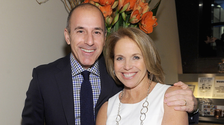 Matt Lauer and Katie Couric posing