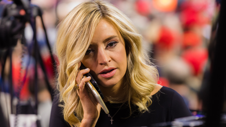 Kayleigh McEnany on the phone while campaigning