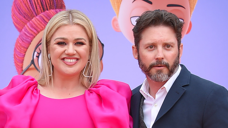 Kelly Clarkson and Brandon Blackstock on the red carpet