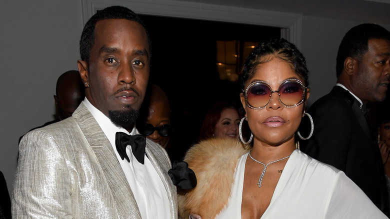 Diddy, Misa Hylton wearing white