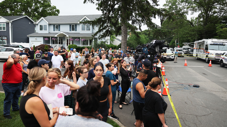 Crowds outside Rex Heuermann's house