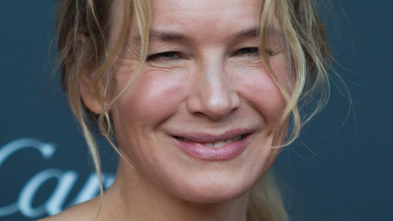 Renee Zellweger smiles on red carpet