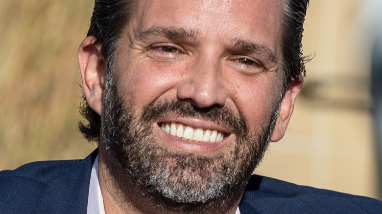 Donald Trump Jr. smiles at an event