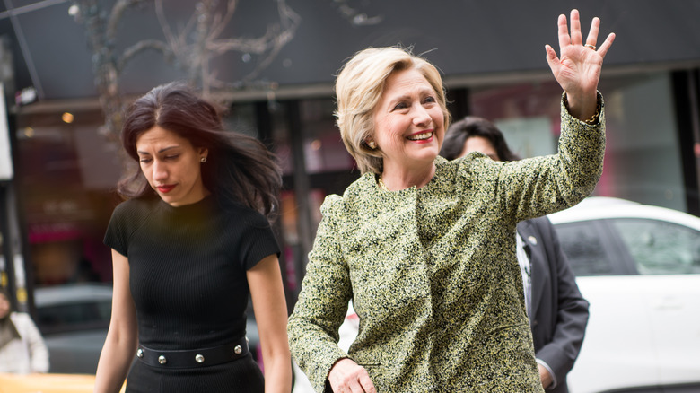 Huma Abedin and Hillary Clinton walking together in 2016