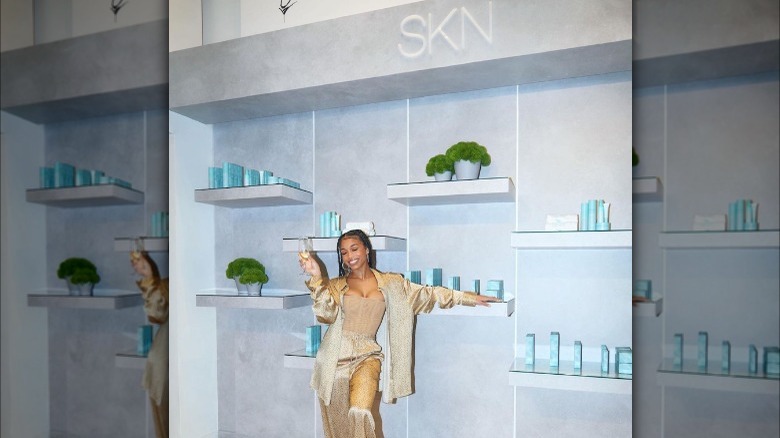 Lori Harvey at pop-up event for SKN by LH