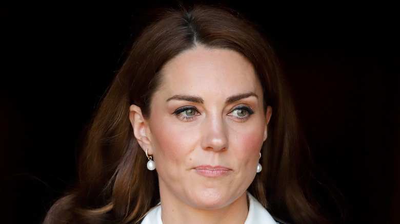 Kate Middleton looking serious in close-up