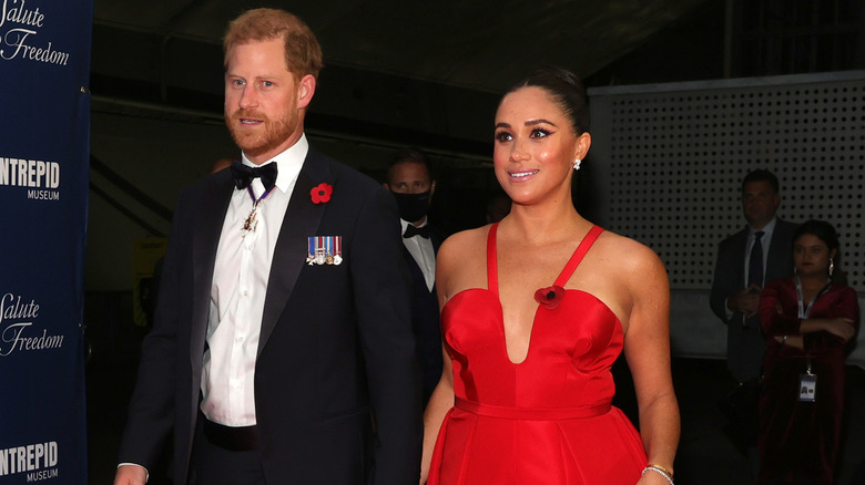 Prince Harry and Meghan Markle walking