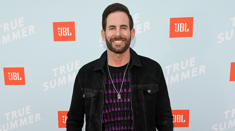 Tarek El Moussa walking the red carpet at the JBL True Summer event