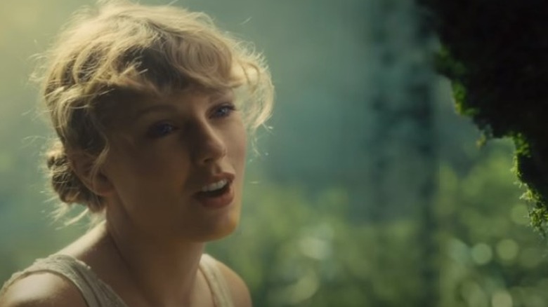 Taylor Swift in music video for "Cardigan"