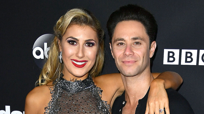 Emma Slater and Sasha Farber posing