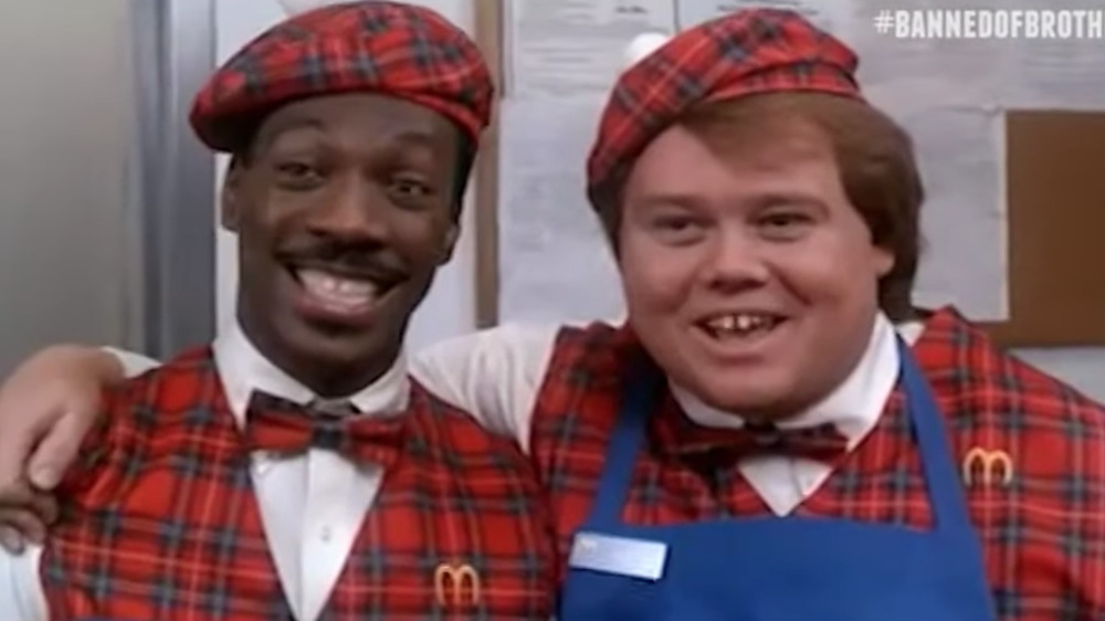 Eddie Murphy and Louie Anderson appearing in Coming to America