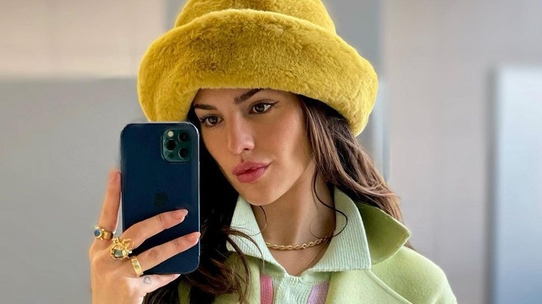 Eiza Gonzalez looking at phone