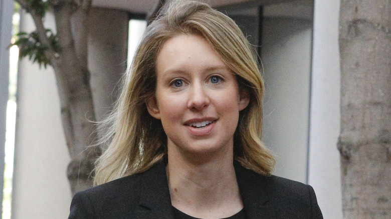 Elizabeth Holmes outside of a court house