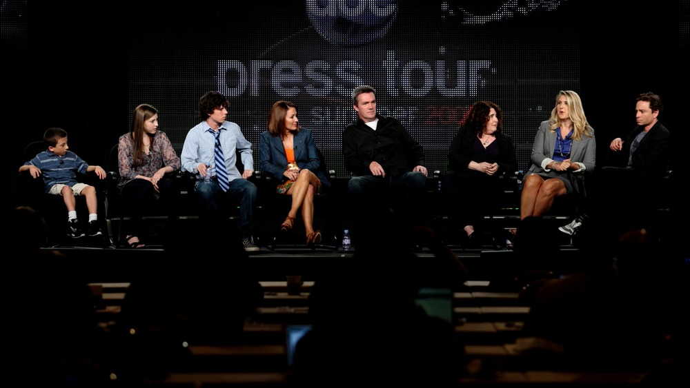 Chris Kattan onstage at a panel with the cast of The Middle 