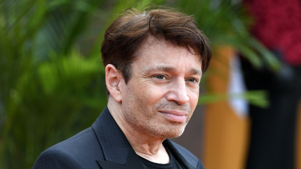 Chris Kattan smirking 