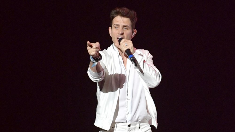 Joey McIntyre performing on stage