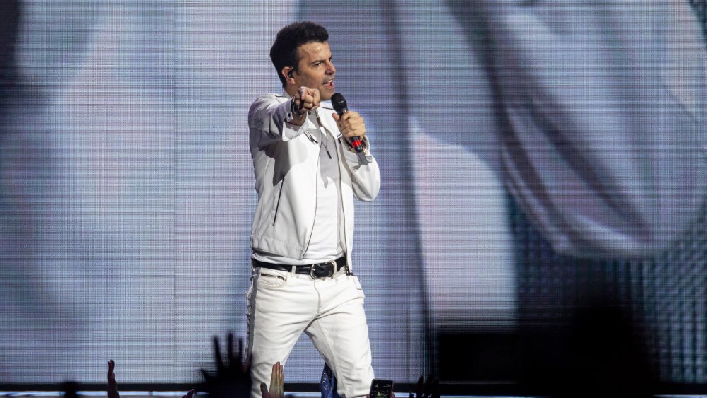 Jordan Knight performing on stage